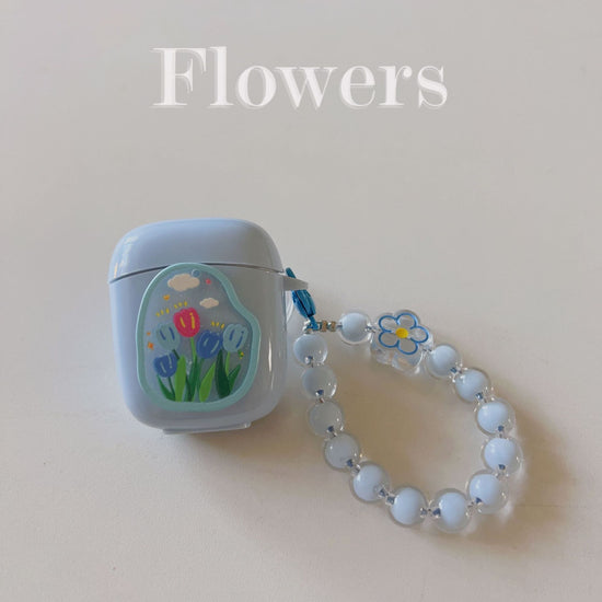 Floral patches + black base shell + colorful bracelet AirPods 1/2