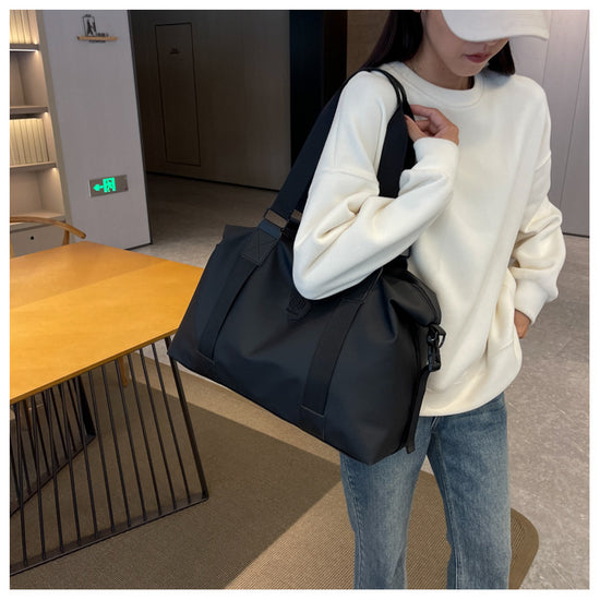 Sleek Black Duffel Bag for Men and Women - Great for Work and Travel