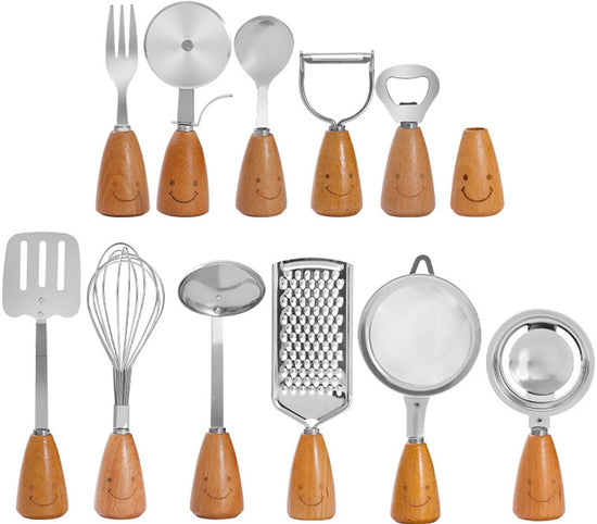 Kitchen Utensil Set - 12 Piece - Includes a peeler, egg separator, spoon, fork, pizza cutter, bottle opener, spatula, slotted spoon, grater, soup ladle, whisk and toothpick holder - The perfect gift for a housewife.