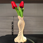 This elegant dress vase combines high-fashion elegance with minimalist home décor. Whether you insert real flowers into the glass tube or display artificial flowers without the tube, it is exceptionally beautiful.