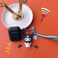 Brown jumpsuit + geometric reindeer Apple AirPods pro