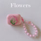 Floral patches + pink base shell + pink bracelet Apple AirPods Pro