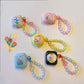 Floral patches + pink base shell + pink bracelet Apple AirPods Pro