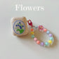 Floral patches + yellow base shell + yellow bracelet AirPods Pro 2