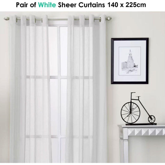 Pair of White Eyelet Sheer Curtains 140 x 225cm