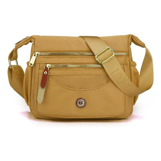 Gold Nylon Crossbody Bag with Multiple Compartments - Compact and Stylish Design