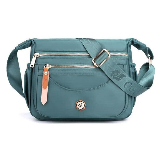 Light Blue Nylon Crossbody Bag with Multiple Compartments - Compact and Stylish Design