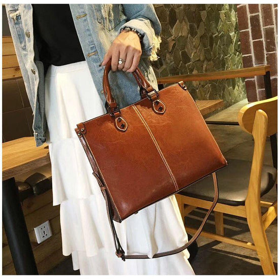 Brown Elegant Leather Handbag - Stylish Brown Tote with Adjustable Strap, Spacious and Durable