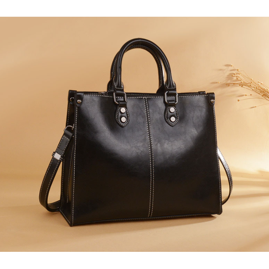Black Elegant Leather Handbag - Stylish Brown Tote with Adjustable Strap, Spacious and Durable