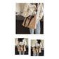 Stylish khaki canvas tote bag with detachable shoulder strap