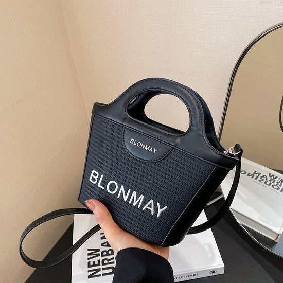 Small and lightweight black BLONMAY bucket bag, perfect for everyday use