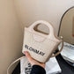 Small and lightweight khaki BLONMAY bucket bag, perfect for everyday use