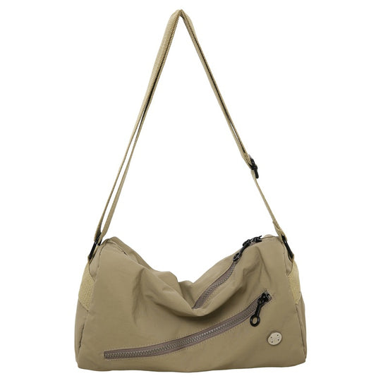 An elegant khaki shoulder bag for travel and work