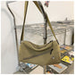 An elegant khaki shoulder bag for travel and work