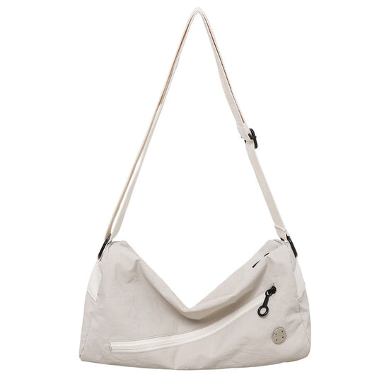 An elegant white shoulder bag for travel and work