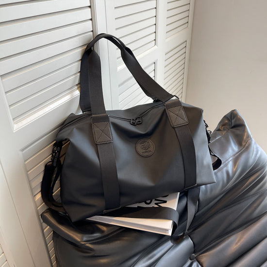 Sleek Black Duffel Bag for Men and Women - Great for Work and Travel