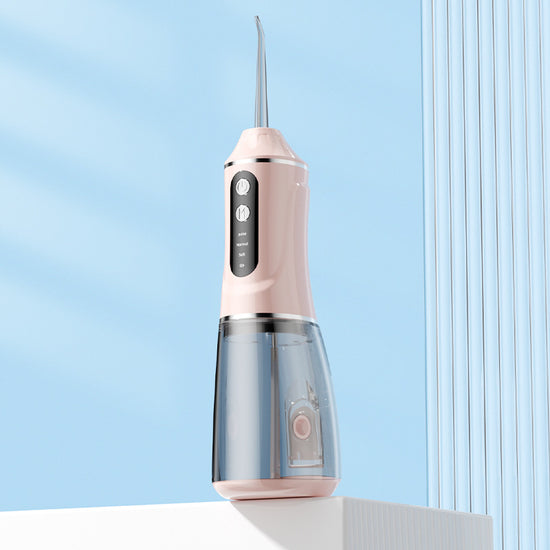 Portable Electric Oral Irrigator with 4 Nozzles 3 Pressure Modes - Pink