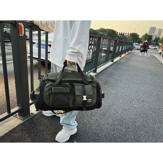 Green Unisex Travel Bag with Utility Buckles and Wet/Dry Compartments