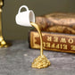 2 Pcs White Cup With Golden "Spill" And Base Magic Pouring Coffee Cup Sculpture - Unique Resin Tabletop Art Accent
