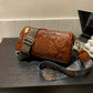 Brown Vintage Embossed Crossbody Barrel Bag with Wide Adjustable Guitar Strap