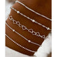 A golden five-piece set Chic Multi-Layered Alloy Bracelet Set - Fashionable Stackable Jewelry