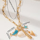 Gold Tone Paperclip Chain Toggle Necklace with Ocean Charms Dolphin Starfish and Seashell Pendant for Summer Beach Holiday