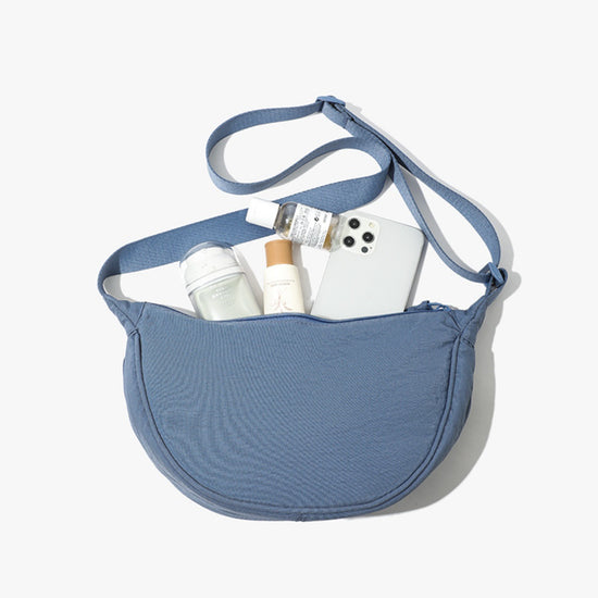 Sea blue Lightweight Nylon Crossbody Bag – Compact Saddle Style with Adjustable Strap for Everyday Use
