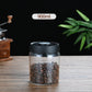 900ml Vacuum Sealed Glass Coffee Canister - One-Press Airtight Storage Jar - Medium Size Moisture-Proof Borosilicate Container for Beans & Pantry (Black Lid)