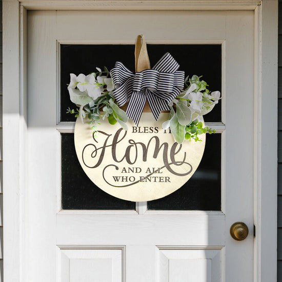 Rustic Wooden Door Hanger – "Bless This Home and All Who Enter" Round Sign with Artificial Flowers & Striped Bow for Front Door, Porch, or Entryway Decor
