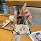 cream-coloured Cute Mini PU Leather Coin Pouch with Tassel Keychain - Printed Pattern Earphone Holder, Small Key Bag for Women, Lightweight Everyday Accessory