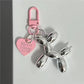 2-Piece Silver Balloon Dog Keychain Set with Heart Charm Bag Pendant Cute Couple Gift(Pink button)
