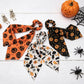 Black Halloween Hair Ties 3 Pack - Festive Pumpkin and Ghost Print Ribbon Scrunchies, Polyester Bow Hair Accessories for Costume Parties, Trick or Treat, and Spooky Event Styling